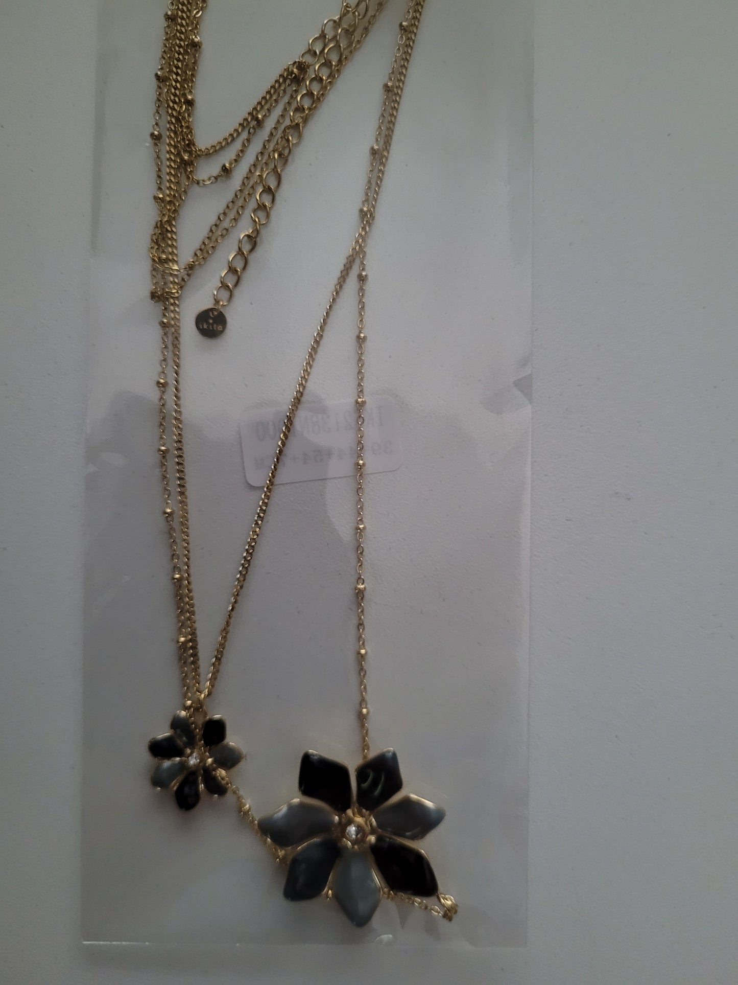 collier double rang fleurs